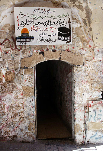 Sign over doorway of house of pilgrim who has been to Mecca, Jerusalem, Israel