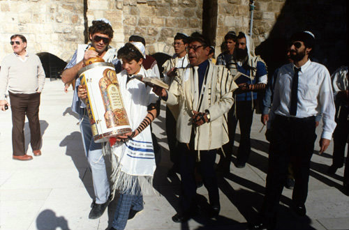 Israel Jerusalem Sephardic Jewish boy carrying the Torah at his Bar mitzvah ceremony