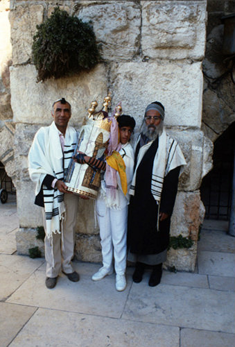 Israel Jerusalem Sephardic Rabbi withfather and son holding Torah at his Bar mitzvah