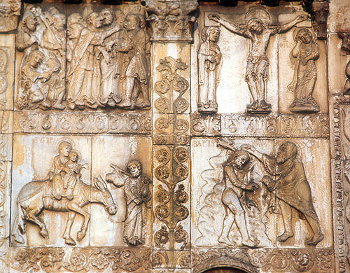 Betrayal, Crucifixion, Flight into Egypt and Baptism, twelfth century bronze door sculpture, San Zeno, Verona, Italy