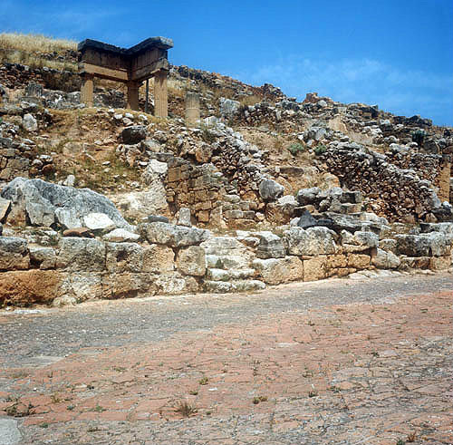 Portion of the brick-paved decumanus with ruins of houses alongside, Solunto, Sicily, Italy