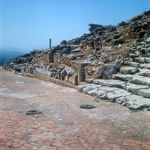 South section of decumanus with stone sockets at intersection with east-west street, Solunto, Sicily, Italy