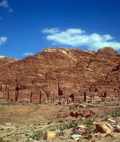 Urn tomb, centre, and other other royal tombs carved in west face of Al-Khubtha mountain, Petra, Jordan
