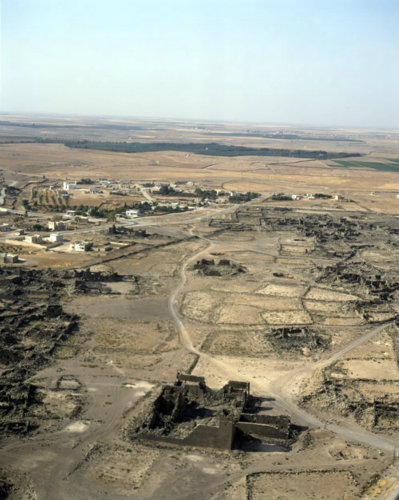 Umm el-Jimal, originally Nabataean city, taken over by Romans, Byzantines, Umayyads and Abbasids, barracks in foreground, aerial, Jordan
