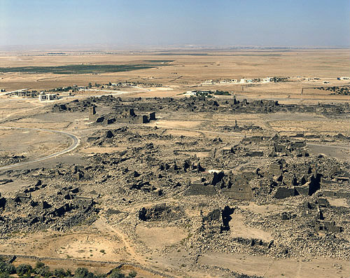 Umm el-Jimal, originally Nabataean city, taken over by Romans, Byzantines, Umayyads and Abbasids, built of black basalt, aerial, north Jordan