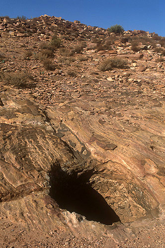 Cistern entrance and water, Umm al-Biyara, Petra, Jordan
