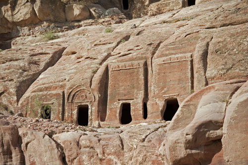 Tombs, Ist century BC-AD, near theatre, showing single crowstep and arch-topped design, Petra, Jordan