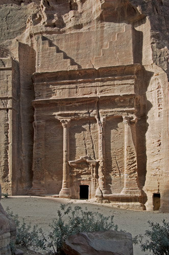 Tomb 69, Ist century BC-AD, west end of Outer Siq, with monumental crowstep, double cornice and classical pillars and portal, Petra, Jordan