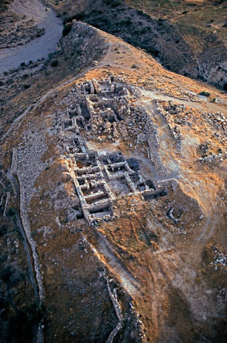 Khirbet adh-Dharih, Nabataean sanctuary and pilgrimage centre, temple near top,large hostel building below, aeral, Jordan