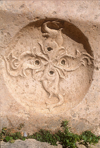 Fish carving on drain hole, Jerash, Jordan