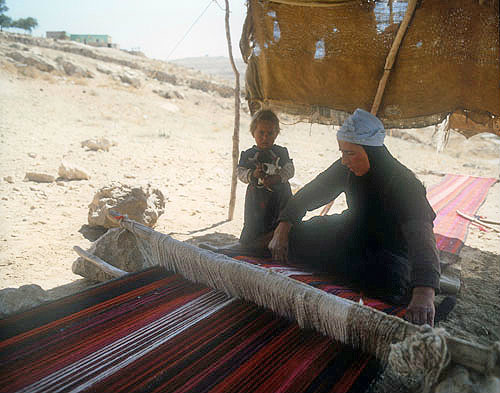 Bedouin woman weaving a rug, Jordan