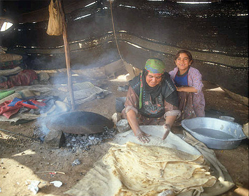 Bedouin woman making bread, Jordan
