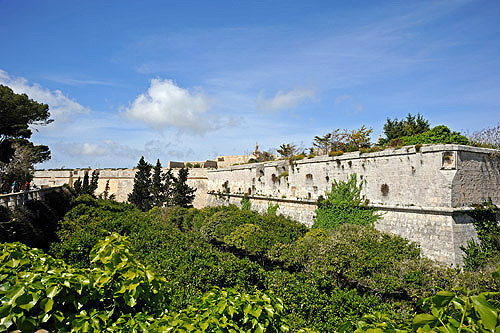 Mdina, twelfth century city walls and moat, Malta