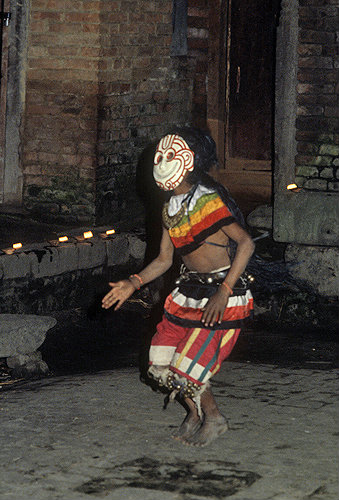 Masked dancer in Bhotebahal courtyard, Kathmandu, Nepal