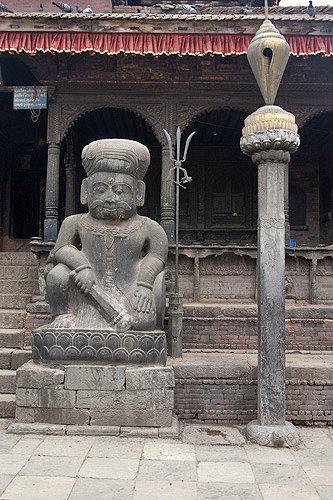 Guardian statue in front of Dattatreya Temple, Durbar Square, Bhaktapur, Nepal