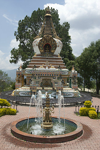 Shrine and fountain in garden of Kopan Tibetan Buddhist Monastery, Kathmandu, Nepal