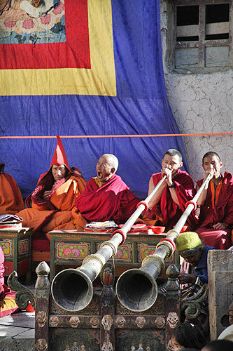 Tibetans blowing long horns, Tiji Festival, Lomanthang, Upper Mustang, Nepal