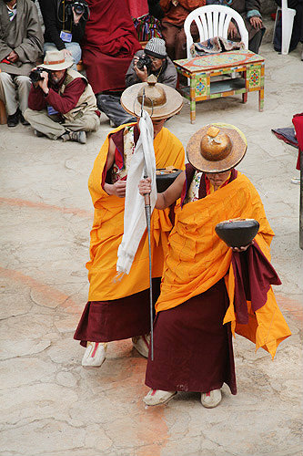 Two saffron-robed dancers, Tiji Festival, Lomanthang, Upper Mustang, Nepal
