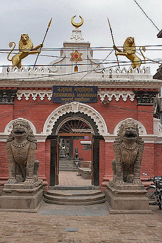 Lions guarding entrance to shrine, Mahavihar temple, Patan, Nepal
