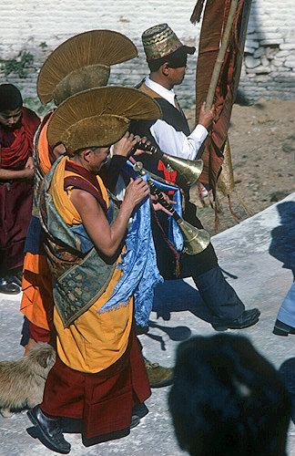 Nepalese monks blowing trumpets, Buddhist New Year festival, Nepal