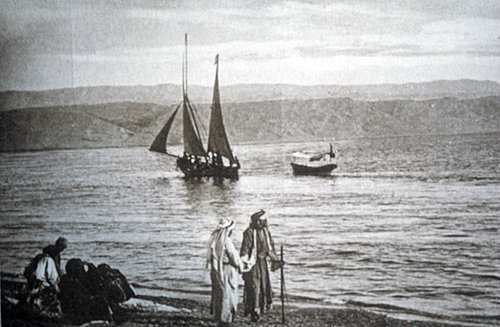 Dead Sea with sailing ship and Arabs on the shore line, circa 1906,  Palestine