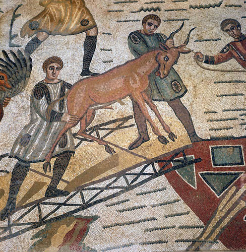 Antelope being loaded for shipping to Rome for games, third to fourth century Roman floor mosaic in imperial villa at Pizza Armerina, Sicily