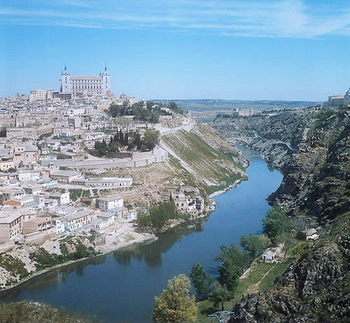 View of part of south east quarter, Alcazar, Castle of San Cervantes, Military Academy and River Tagus, Toledo, Spain