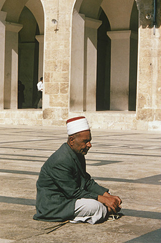 Syria, Aleppo, a blind man praying in the courtyard of the Great Mosque
