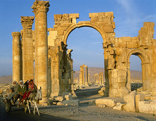 Syria, Palmyra, triumphal arch and donkey cart