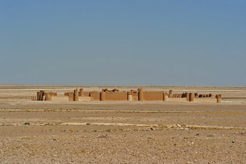 Western complex seen from west, of early eighth century Ummayad castle, Qasr al Hayr, built in desert by Umayyad caliph Hisham, Syria