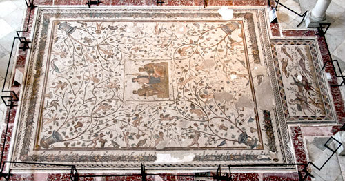 Dionysus giving vine stock to Ikarios with vines and putti, hunting on horseback with dogs, on right, Bardo Museum, Tunis, Tunisia