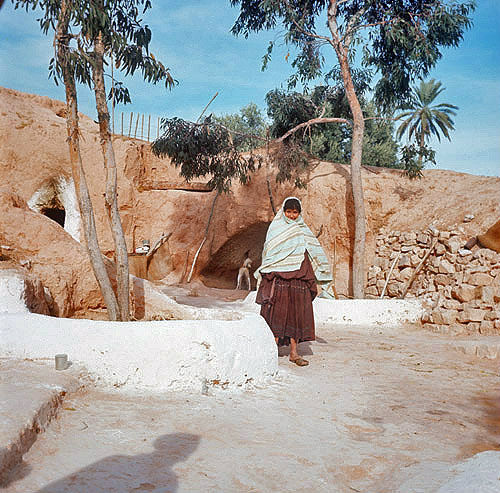 Berber Troglodyte woman and dwelling, Matmata, Tunisia