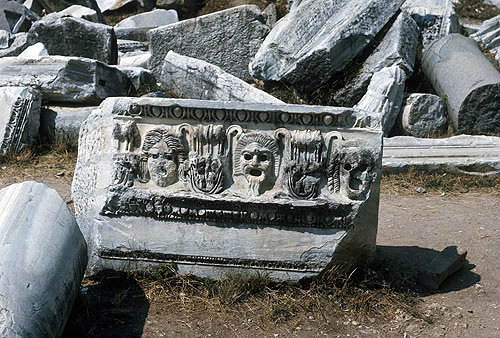 Frieze of masks on fallen fragment of marble from theatre, Side, Turkey