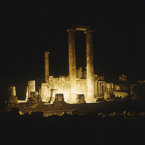 Temple of Apollo floodlit, foreground columns date from second century BC, Didyma, Turkey