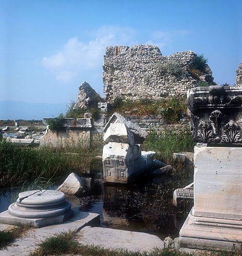 Corner of second century AD Roman Nymphaion (fountain) seen from front of basilica, fifth century AD