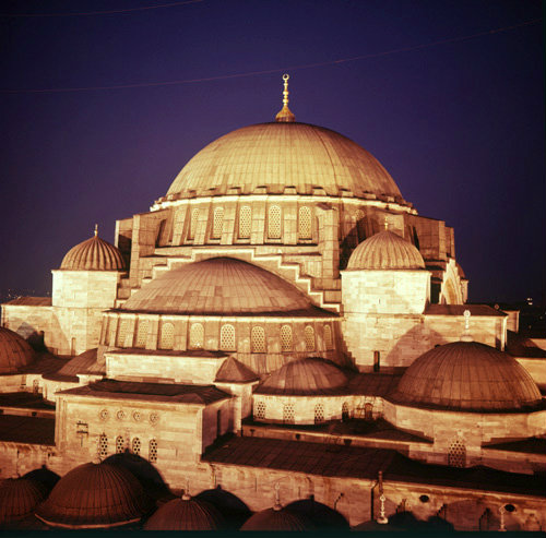 Turkey Istanbul illuminated dome of the Suleymaniye Mosque built by Sinan in 16th century