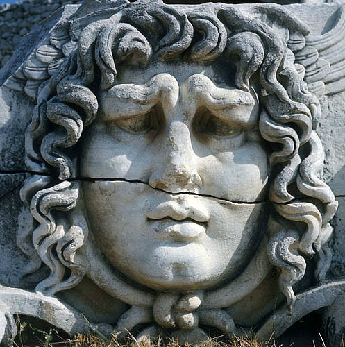 Head of Apollo sculpted in marble, in vicinity of Temple of Apollo, Didyma, Turkey