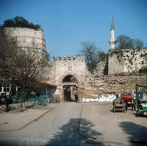 Silivri Kapise, one of eleven gates in the city walls, with minaret of Kadim Ibrahim Pasa Mosque, Istanbul, Turkey