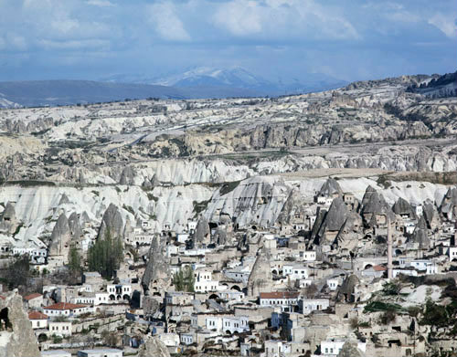 View over Macan Valley, Mount Erciyas extinct volcano on horizon, Cappadocia, Turkey