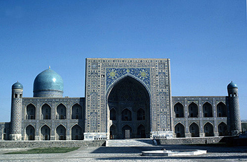 Uzbekistan, Samarkand, Tillya Kari Madrasa, exterior view, decorative tilework