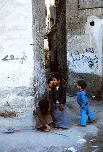 Little boys playing in street, Sana
