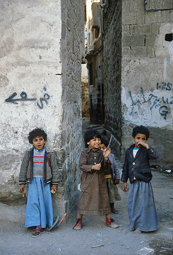 Children playing in street, Sana