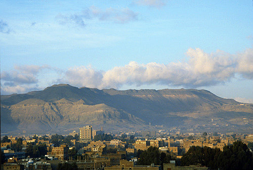 View over new city, mountains behind, Sana