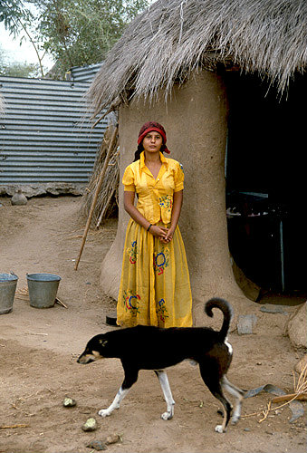 Woman outside her home, North African village, Tihama, Yemen