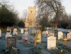 Church of St Mary the Virgin and frost on graves at sunrise, Weston Turville, Buckinghamshire, England