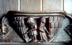 Misericord of the month of August, fifteenth century, reaping, man with sickle, woman with crook, Church of St Mary, Ripple, Worcestershire