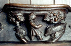 Misericord of the month of October, fifteenth century, man beating down acorns to feed pigs, Church of St Mary, Ripple, Worcestershire