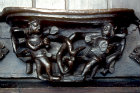 Misericord of the month of January, fifteenth century, two men wooding, Church of St Mary, Ripple, Worcestershire