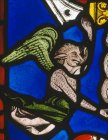 Detail of a devil in panel 34 of the Poor Mans Bible Window number 1 in Canterbury Cathedral 13th century
