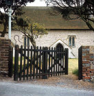 Tapsel gate, rare form of lych gate, with central pivot and hook of shepherd